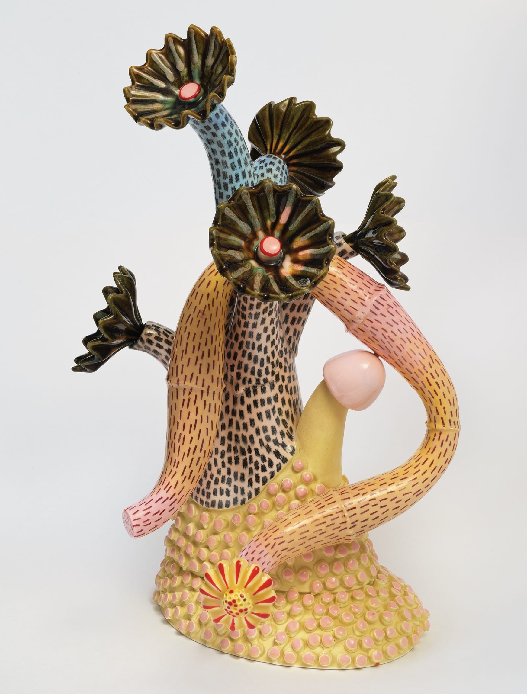 a ceramic sculpture by Megan Bogonovich resembling an abstract, otherworldly plant or flower